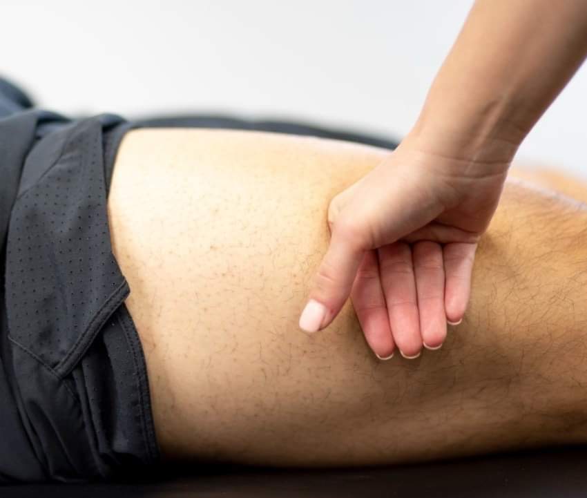 thigh massage Revolve Therapy